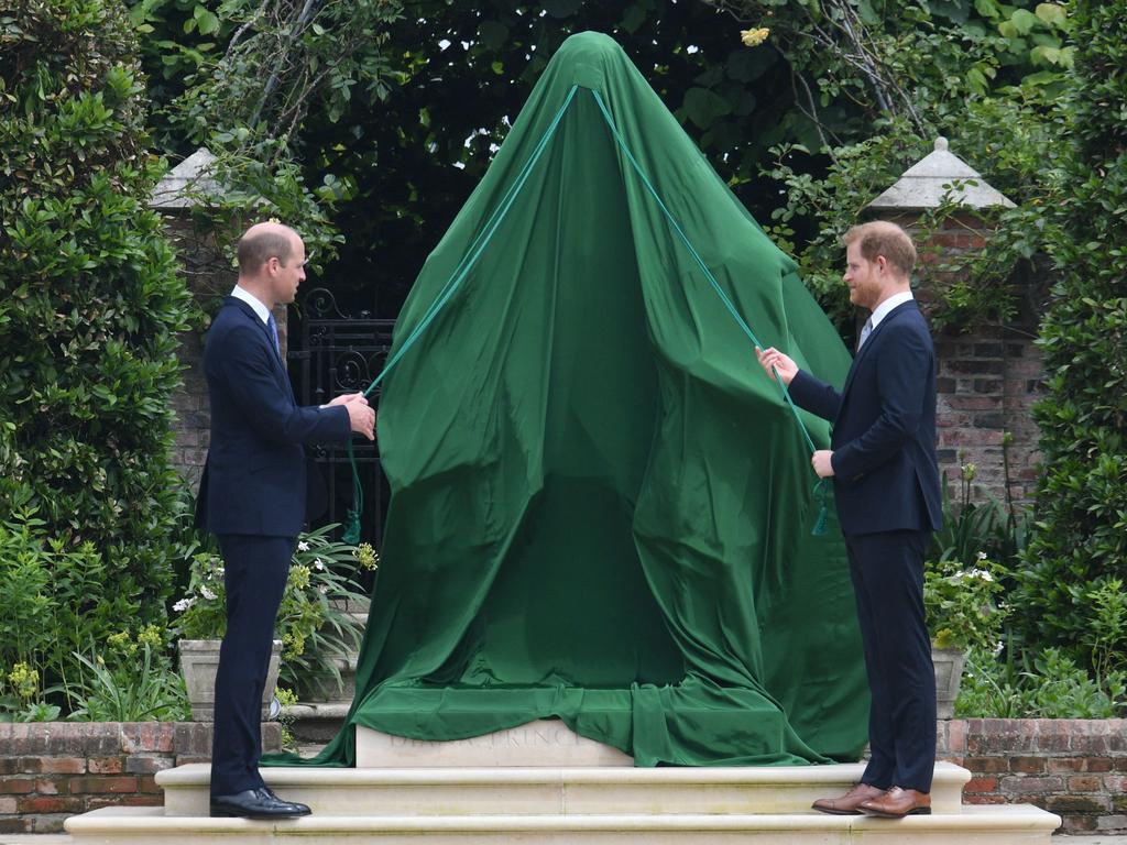 Britain's Prince William and Prince Harry unveil a statue of their mother, Princess Diana on what would have been her 60th birthday. Picture: Dominic Lipinski.