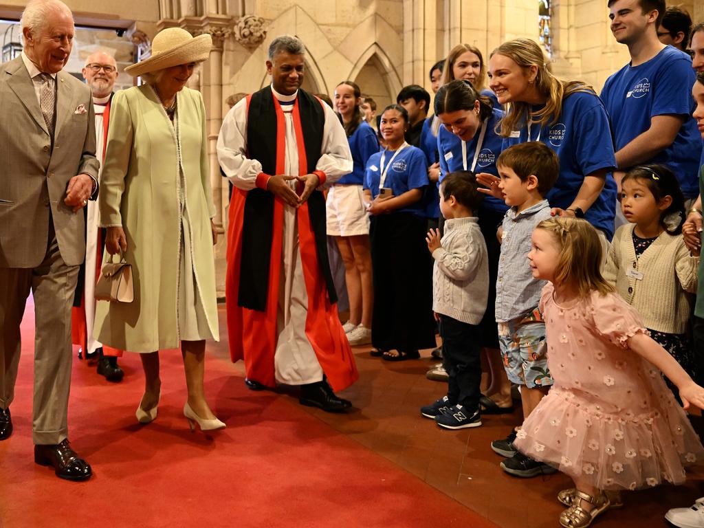 One little girl was ready with a cute curtsy as Charles III and Queen Camilla entered St Thomas' Anglican Church in Sydney for a Sunday morning service on October 20. Picture: AAP Image/Dean Lewins