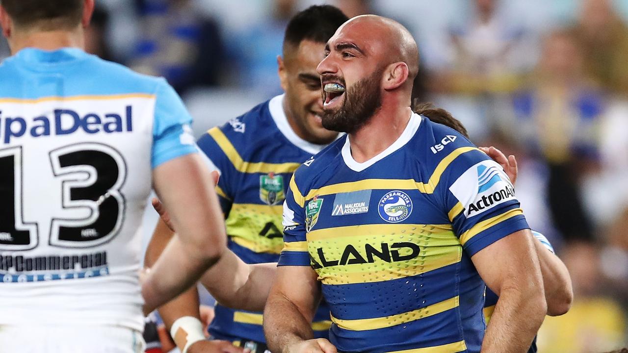 Tim Mannah of the Eels celebrates a try.