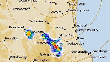 A storm moving east over the Gold Coast Monday afternoon. Several storms are forecast for the southeast over the coming days.