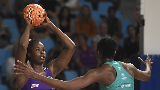 CAIRNS, AUSTRALIA – SEPTEMBER 20: Romelda Aiken of the Firebirds looks to pass the ball past Kadie-Ann Dehaney of the Vixens during the round 13 Super Netball match between the Melbourne Vixens and the Queensland Firebirds at the Cairns Pop Up Arena on September 20, 2020 in Cairns, Australia. (Photo by Ian Hitchcock/Getty Images)