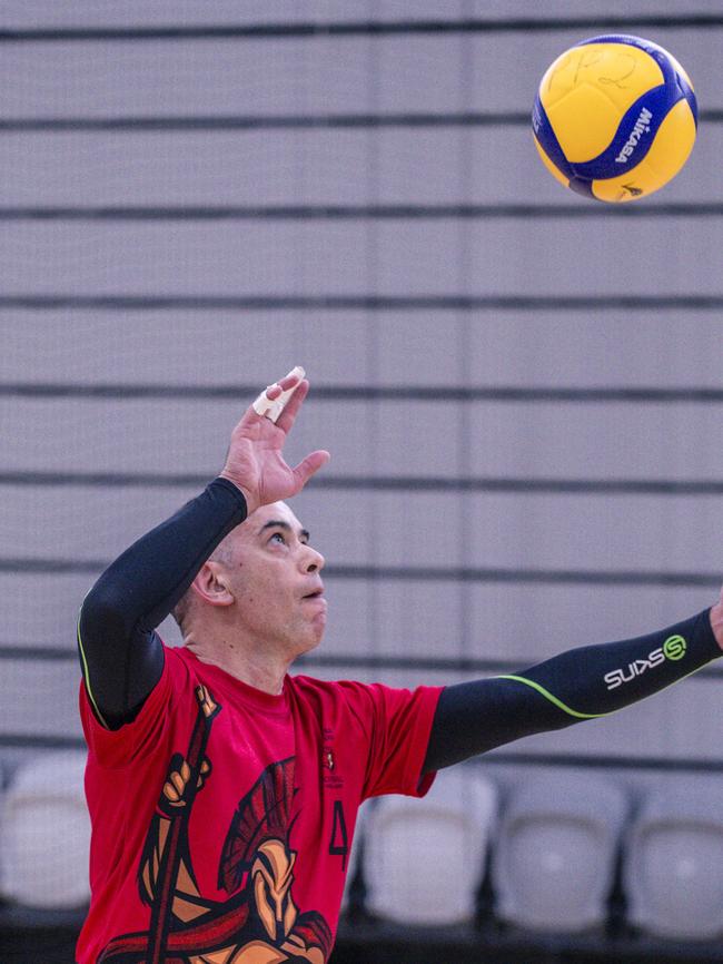 Action as Sparta v the Crippled Wombats in the Pan Pacific Masters Games Volleyball tournament. Picture: Glenn Campbell