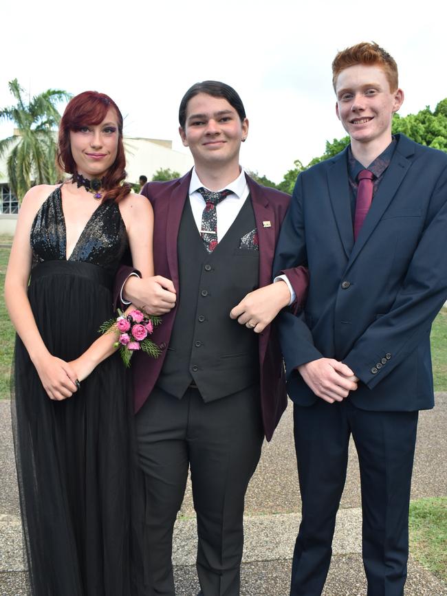 Derna-Jayde Hunt, Coltan Shaw-Murphy and Vincent Love at the Sarina State High School formal at the MECC, Mackay, on Thursday November 19. Picture: Zizi Averill
