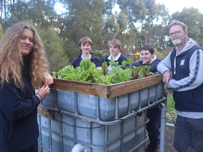 Agriculture teacher Will Vangeninden with students at Terang College.