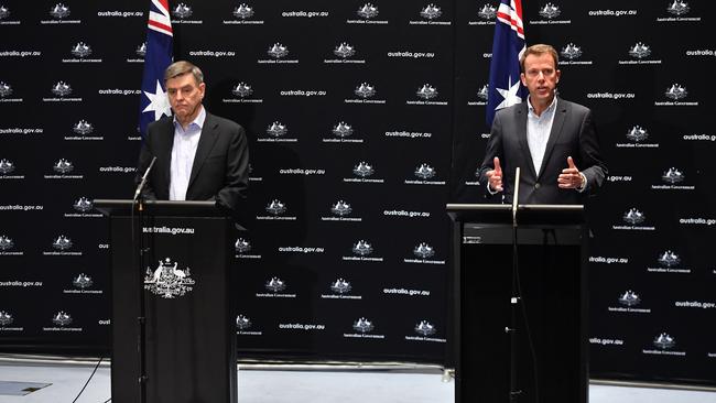 Chief Medical Officer Professor Brendan Murphy and Minister for Education Dan Tehan speak to the media at a press conference at Parliament House in Canberra.