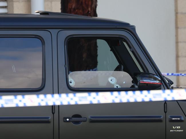 The bullet holes in Abdulrahim’s car after the shooting. Picture: Brendan Beckett