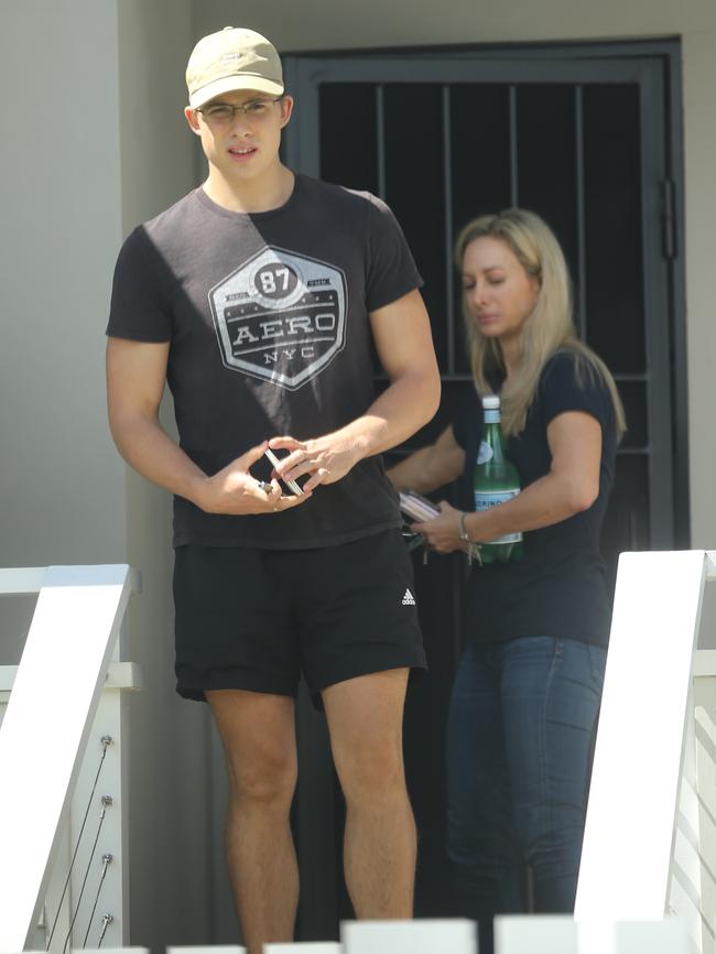 Kyle Daniels leaving his home with his mother earlier this month. Picture: John Grainger