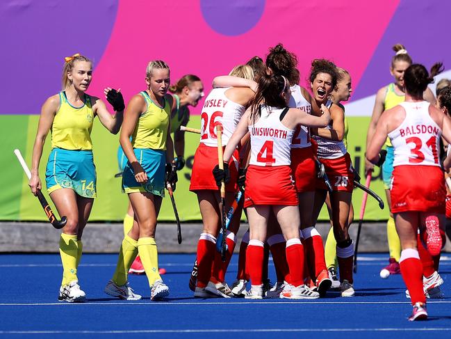 BIRMINGHAM, ENGLAND - AUGUST 07: Holly Hunt of Team England celebrates with team mates after scoring their sides first goal during the Women's Hockey - Gold Medal Match between England and Australia on day ten of the Birmingham 2022 Commonwealth Games at University of Birmingham Hockey & Squash Centre on August 07, 2022 on the Birmingham, England. (Photo by Mark Kolbe/Getty Images)