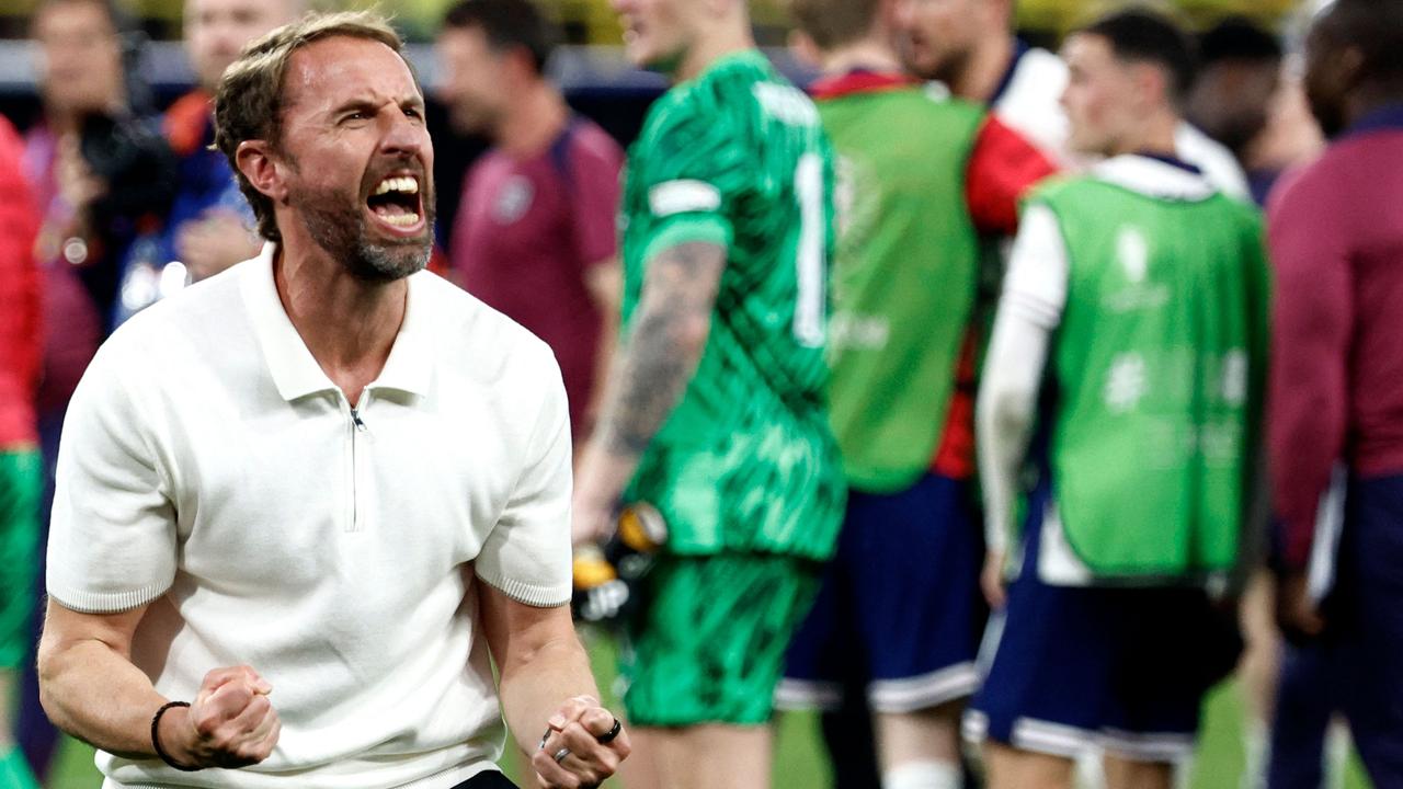 England’s head coach Gareth Southgate celebrates. (Photo by KENZO TRIBOUILLARD / AFP)