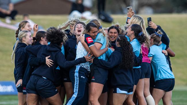 NSW girls celebrate at the end of the event.