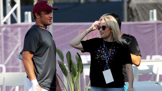 The couple caught up for a chat off the court. Picture: Toby Zerna