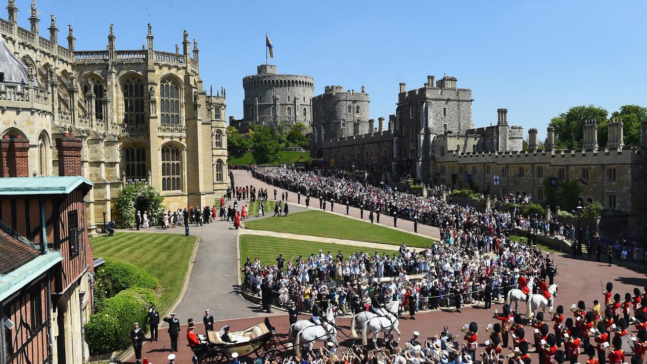 The ceremony will be held at St Georges Chapel (left) but the crowds will be nothing like that for the wedding of the Duke and Duchess of Sussex in 2018. Picture: Shaun Botterill/Getty Images.