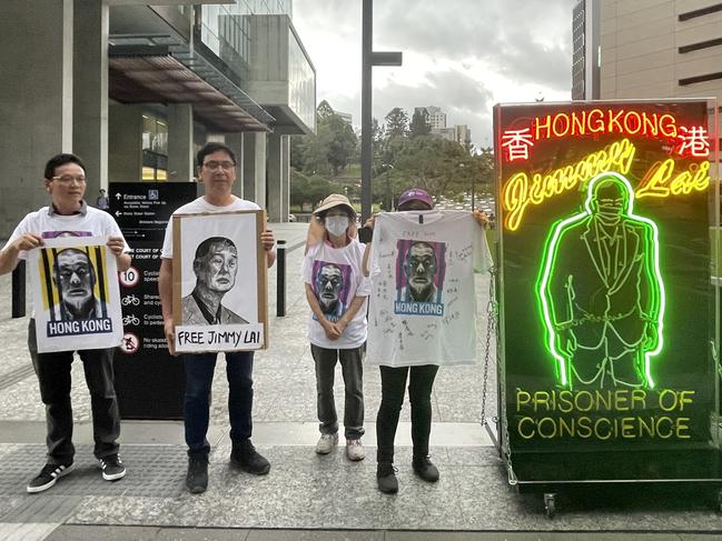 Activists outside Brisbane’s Supreme Court to protest an Australian judge’s role in Hong Kong’s Appeal Court.