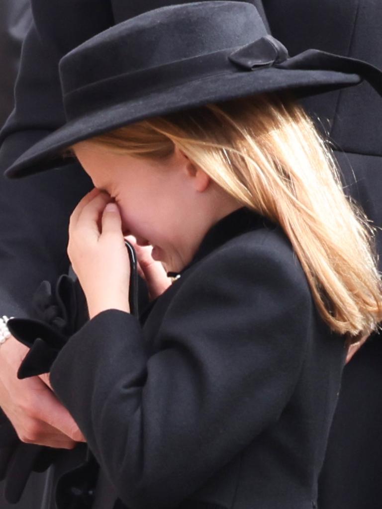 Princess Charlotte cries as the Queen’s coffin passes. Picture: Phil Harris – WPA Pool/Getty Images