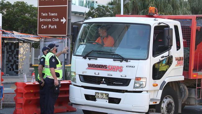 Border bedlam on the QLD/NSW border in Griffith St Coolangatta. Police and Emergency Services stop members of the public on the border for questioning. Picture Glenn Hampson