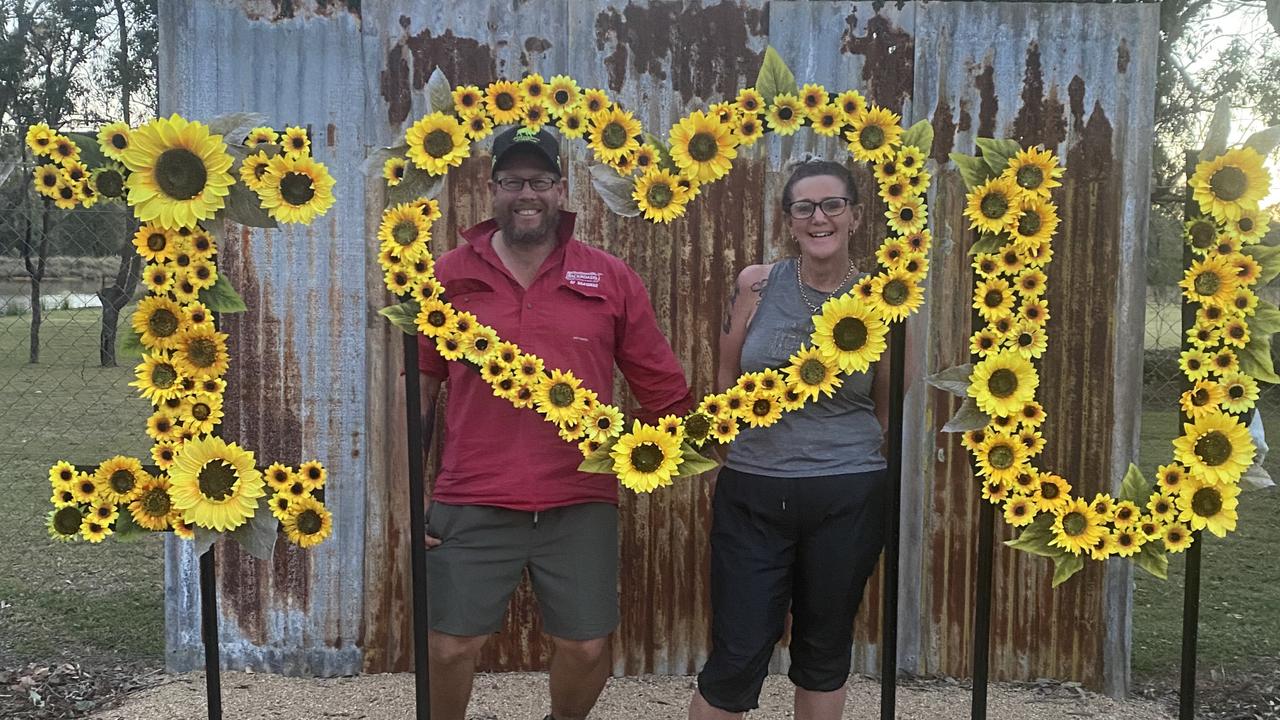 Wild Grounds Cafe owners Kylie and Greg Parker in the designated ‘I heart you’ photo space. Photo: Contributed