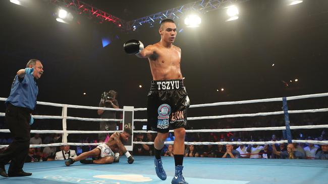 Tim Tszyu celebrates after knocking down Denton Vessell. Picture: Brett Costello