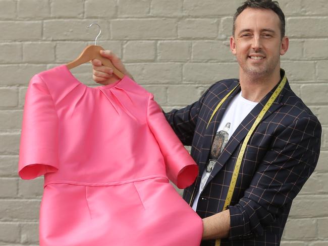 Brisbane designer Daniel Moore from Alter-Ego has created some of the Queensland Premier's dresses for the Commonwealth Games. Pic Mark Cranitch.