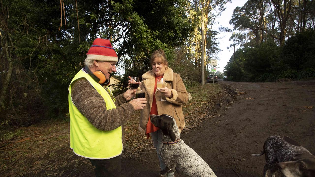 Kalorama resident Vanessa shares a drink with her neighbour, Barry, on Ridge Road. Picture: Arsineh Houspian