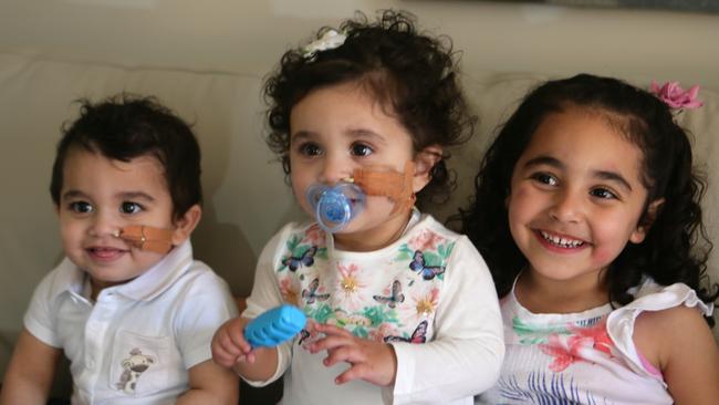 Siblings Isaac, Charlize and Amelia Gravina pictured at home last year.