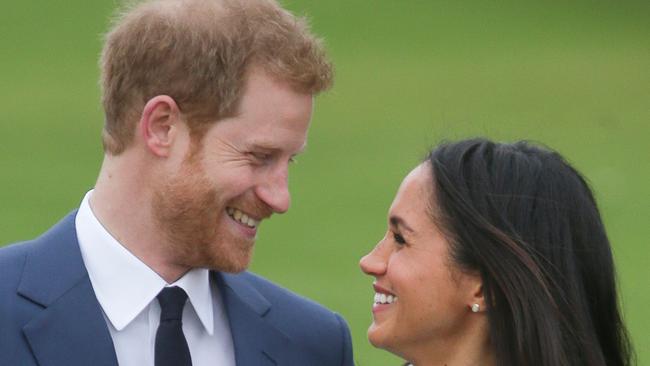 What will Prince Harry and Meghan Markle’s first kiss look like? Picture: AFP