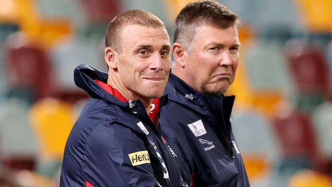 AFL Round 17. 12/09/2020. GWS Giants vs Melbourne at the Gabba, Brisbane..   Simon Goodwin, senior coach of the Demons and CEO Gary Pert     . Pic: Michael Klein