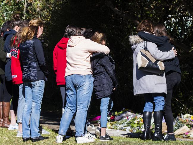 People laid flowers and paid their respects. Picture: Jenny Evans