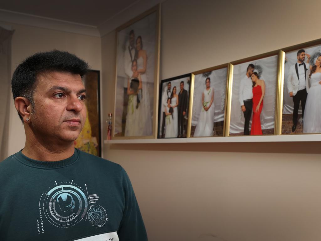 Vikas Sharma in a room filled with photos of his sister. Picture: David Caird