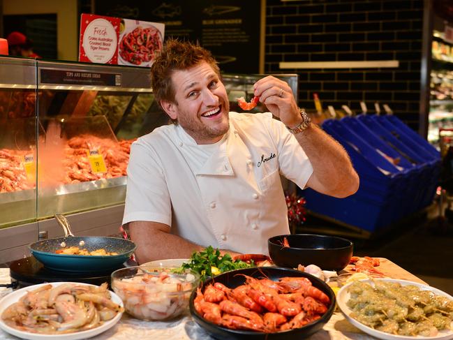 Curtis made a surprise appearance at Coles Southland in Melbourne, showing customers how to peel prawns. Picture: Nicki Connolly