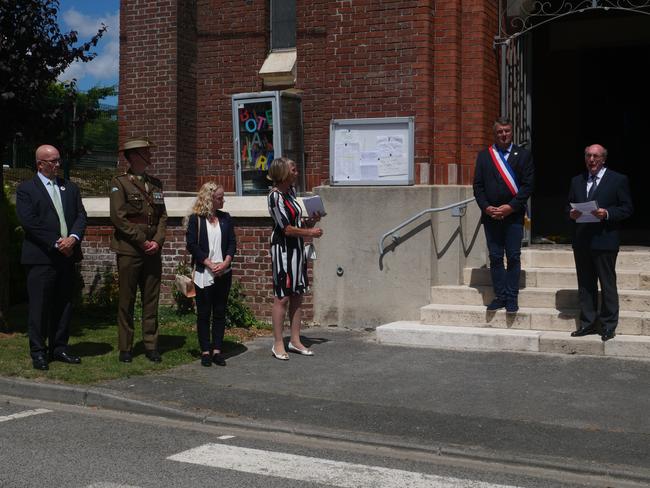 SA Agent General David Ridgway and former Labor MP Jane Lomax-Smith at the ceremony in Dernancourt, France, during which soil was taken from a First World War battlefield for an Adelaide memorial. Picture: supplied