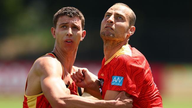 GOLD COAST, AUSTRALIA - NOVEMBER 25: Jarrod Witts and Max Knobel during a Gold Coast Suns AFL training session at Austworld Centre Oval on November 25, 2024 in Gold Coast, Australia. (Photo by Chris Hyde/Getty Images)