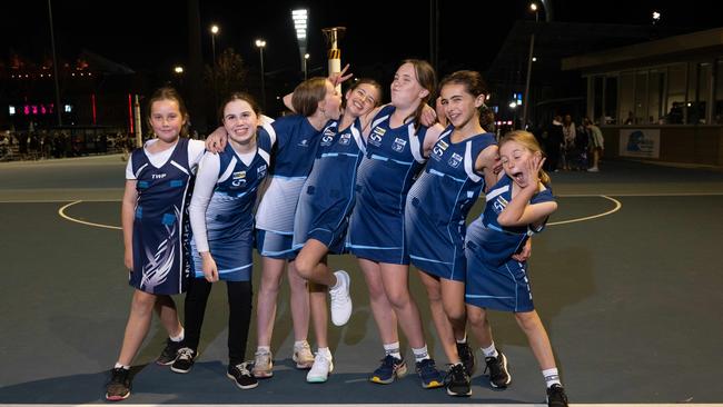 Winchelsea Navy under-11 netball team pull their funniest faces.