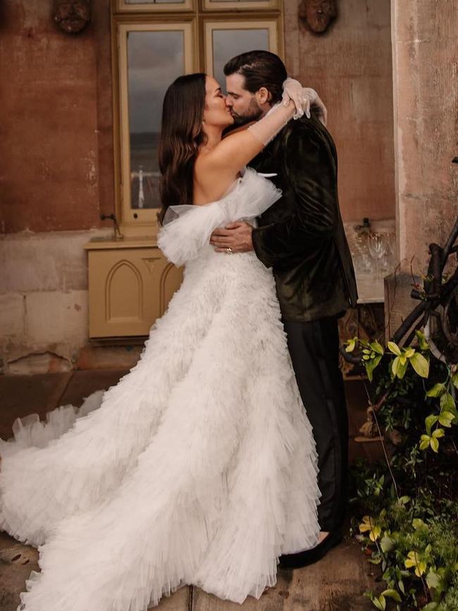 The couple share a kiss after their nuptials. Picture: Instagram