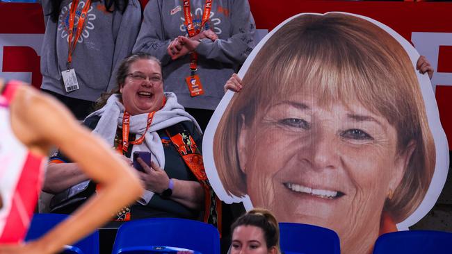 A fan holds up a Julie Fitzgerald head during the round 10 Super Netball match between Giants Netball and Adelaide Thunderbirds. Photo: Getty Images