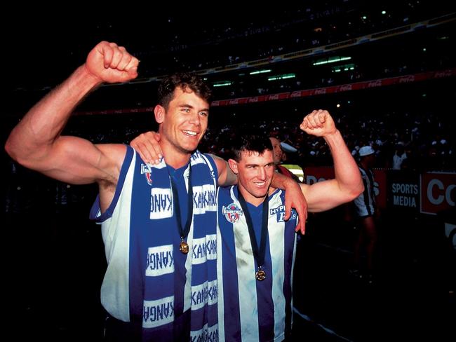 Carey and Anthony Stevens celebrate the 1996 premiership. Picture: AFL Photos/GSP.