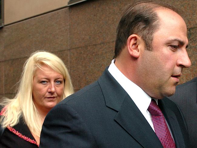 15 Nov 2004 : Gangland boss, Tony Mokbel with his legal team Nicola Gobbo (left) and Con Heliotis QC (right) outside the Magistrates Court - crime Vic drugs headshot mobile phone profile