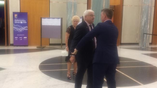 James Ashby and Brian Burston clash in Parliament House.