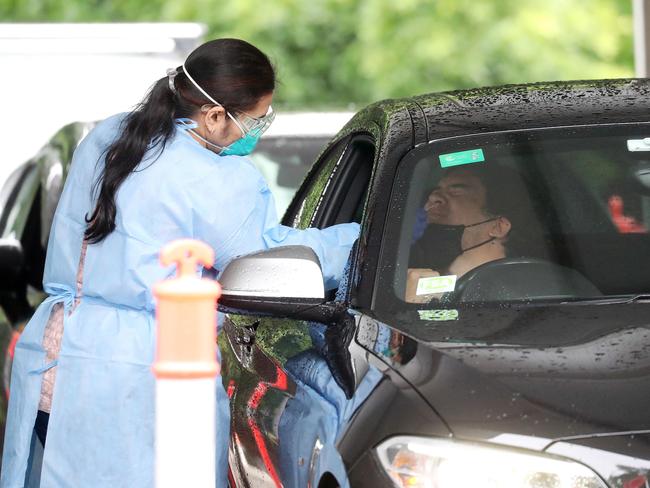 A COVID test being done at the Avalon Beach drive through testing clinic in December 2020 during the northern beaches lockdown. Picture: Tim Hunter.