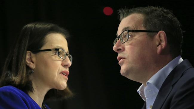 Former Victorian health minister Jenny Mikakos, leeft, and Victorian Premier Daniel Andrews. Pictures: Getty Images