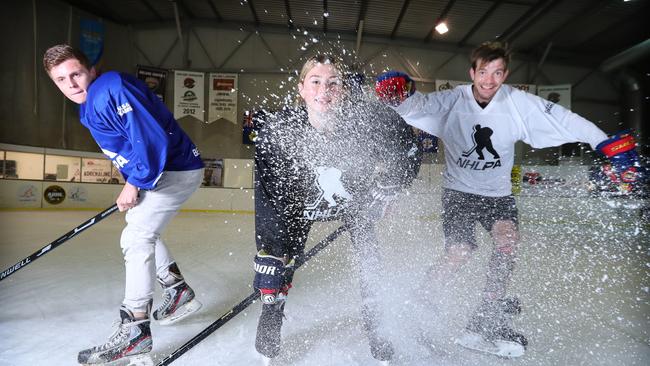 Declan Billingsley, Lily Munday and Dathan Lomas, graduates from the Ice Factor program at the Thebarton Ice Arena. Picture: Tait Schmaal