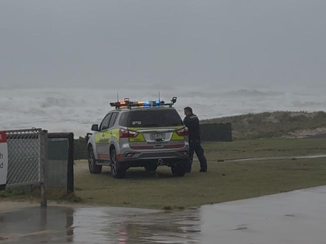 First responders searching for lost swimmers at Surfers Paradise.