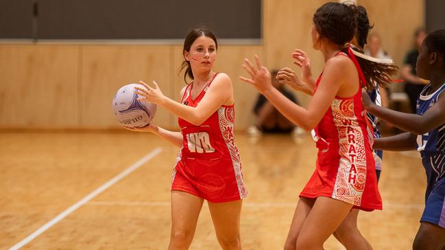 Waratahs Red against the Casuarina Cougars in the 2023 Darwin Netball under-13 Div 2 grand final. Picture: Pema Tamang Pakhrin