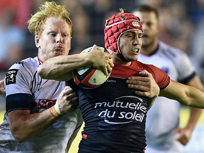 RC Toulon's Australian fullback James O'Connor (R) vies for the ball with Australian lock Peter Kimlin during the French Top 14 rugby union match between RC Toulon and Grenoble in October last year. Picture: AFP