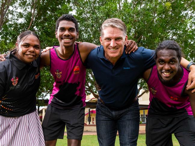 Australian Wallabies legend Tim Horan drops into Haileybury Randall School with Stars Foundation and Clontarf Foundation students for a chat. Students Susie Jones (Timber Creek), Brett Wilson (Peppimenarti), Wallaby Tim Horan and Samuel Dhurrkay (Galiwinku).Photograph: Che Chorley