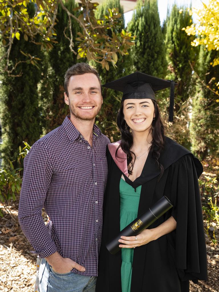 Bachelor of Education (Early Childhood) graduate Jenna Pedler celebrates with Mason Hartog at a UniSQ graduation ceremony at Empire Theatres, Tuesday, June 27, 2023. Picture: Kevin Farmer