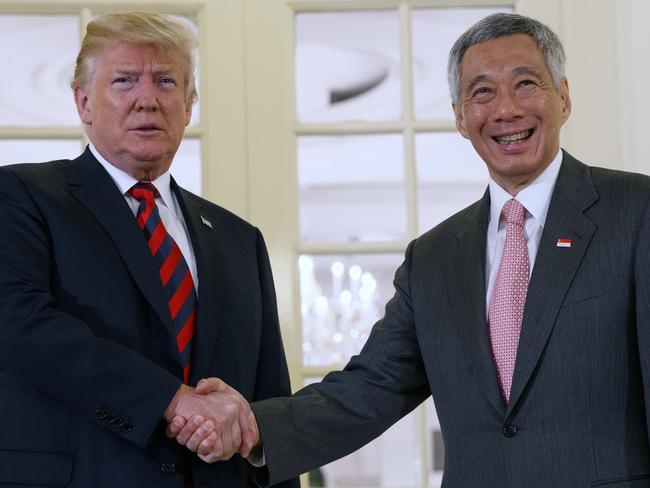 President Donald Trump shakes hands with Singapore Prime Minister Lee Hsien Loong. Picture: AP