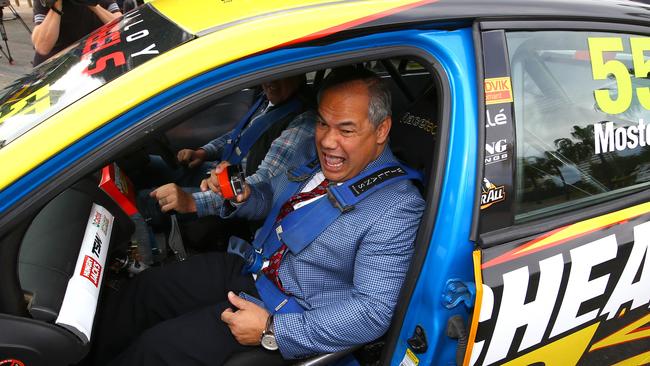 Mayor Tom Tate loves being behind the wheel but hates being caught in the traffic on the M1. He has told Federal Government bureaucrats to “get off your arse”. Photo: David Clark