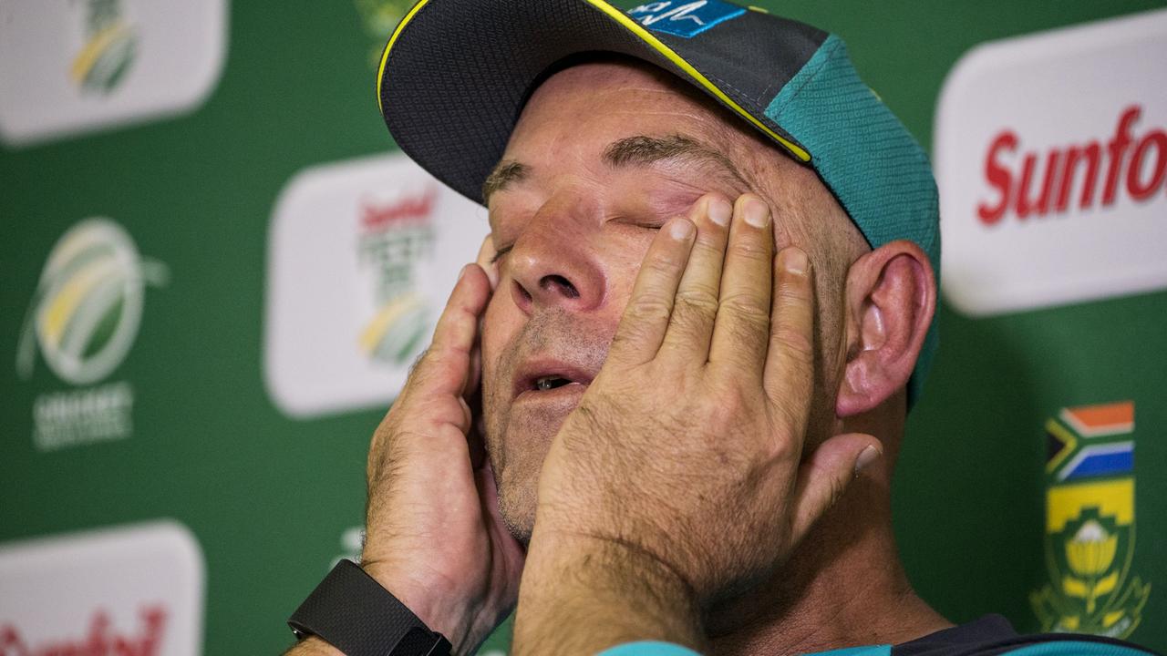 The stress shows on Darren Lehmann during a press conference in 2018 where he announced his resignation as Australia cricket coach. Picture: AFP PHOTO (Wikus Ikus De Wet)