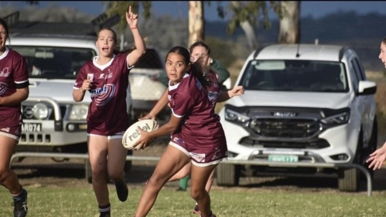 Aaliyah Murray makes a pass for the Dalby Devils.