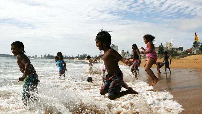 Psalm 34: Taste, and see how sweet the Lord is; blessed is the man who trusts in Him. Aboriginal children from the community of Brewarrina in the state's far west, play at the beach for the first time at South Narrabeen Beach in Sydney. Photo by Krystle Wright